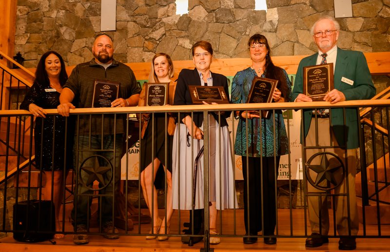 Award recipients on stage at the 2024 Gala