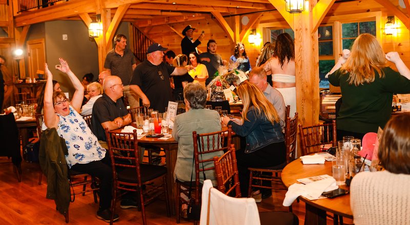 Guests enjoying dinner and live entertainment at the 2024 Gala